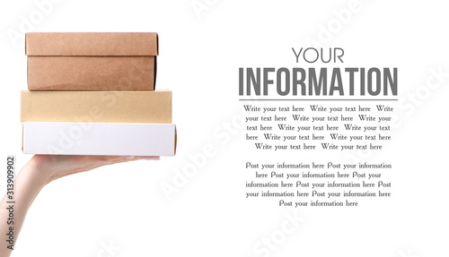 Boxes delivery business in hand on white background isolation, space for text