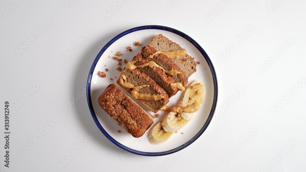 Sliced banana bread, peanut butter and banana Sliced banana bread, peanut butter and banana