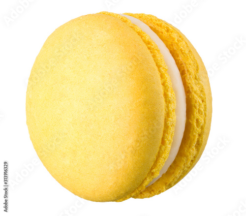 Foto Macro photo of french yellow macaroon isolated on white