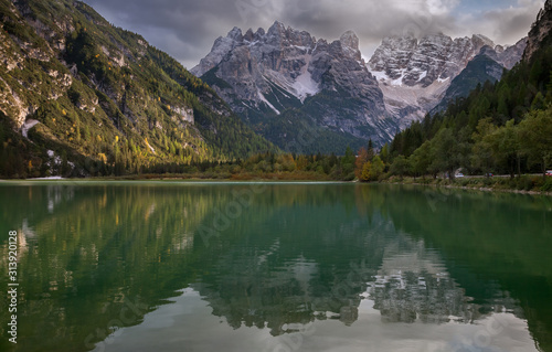 Autumn evening on Lake Landro in the Dolomites (Italy)