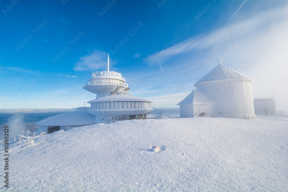 peak of Sniezka mountain in Giant Mountains in Poland and Czech republic border during winter