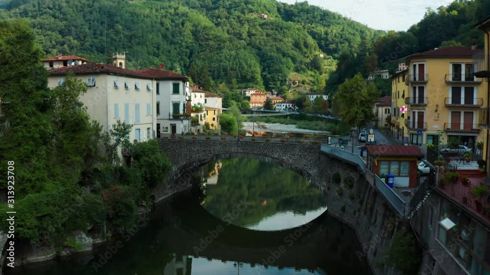 Bagni di Lucca (formerly Bagno a Corsena), Italy, Aerial push over old stone bridge Bagni di Lucca (formerly Bagno a Corsena), Italy, Aerial push over old stone bridge