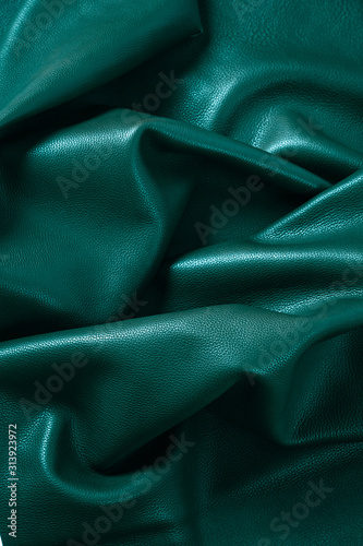 Texture cuir vert bronze plissé