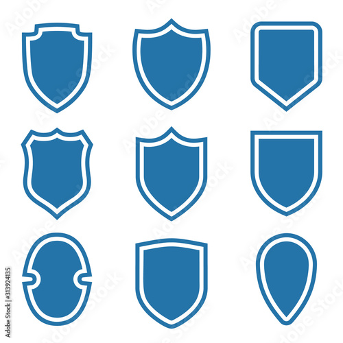 Free Download Shield shape icons set. Blue label signs. Symbol of protection, - GFXLoad