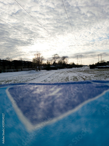View of a winter day soft focus over a blue sled.