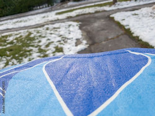 View of a winter day soft focus over a blue sled.