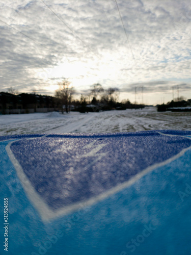 View of a winter day soft focus over a blue sled.