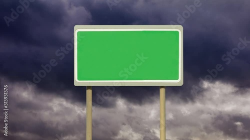 A blank road sign with a background of a time lapse of a gathering of dark storm clouds. Going no where. Going to an empty future. Going to a stormy and unsettled future.