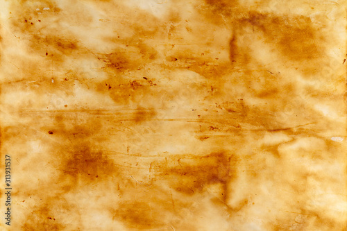 Burned old sheet of paper. Texture of old paper.