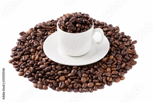 Coffee beans and a white cup isolated on white background