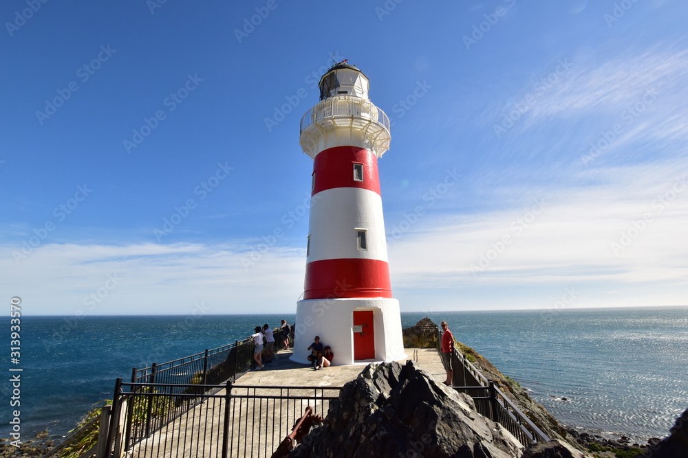 Beautiful colorful lighthouse in Cape Palliser New Zealand