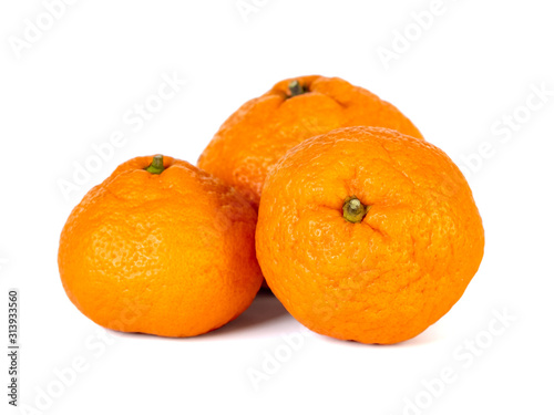 Tangerines or mandarines on a white background, raw fruit