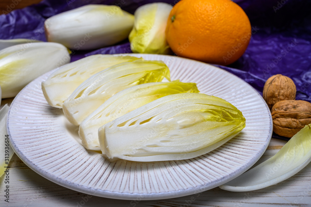 Fresh white belgian endive or chicory heads Fresh white belgian endive or chicory heads