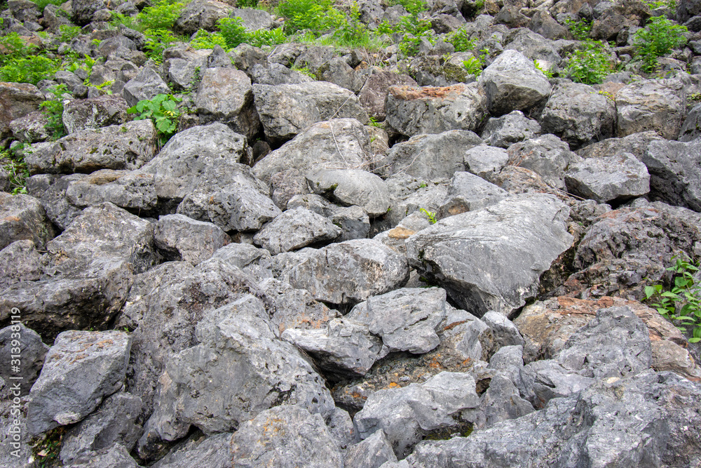 Texture of a stone wall. Old castle stone wall texture background. Stone wall as a background or texture. Part of a stone wall, for background or texture