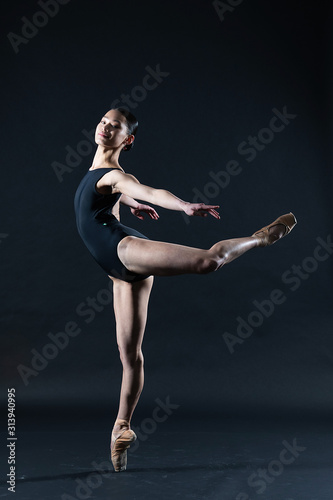 Teenage Asian girl in ballet dance pose for portrait