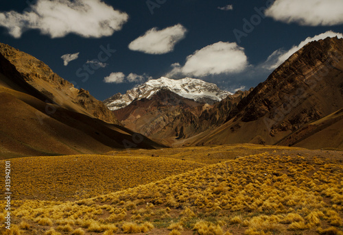 Andes mountain range. Majestic view of the Aconcagua mountain with a snowy peak in Mendoza, Argentina photo