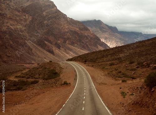 Empty road in the Andes mountain range desert, on the way to Aconcagua mountain in Mendoza, Argentina