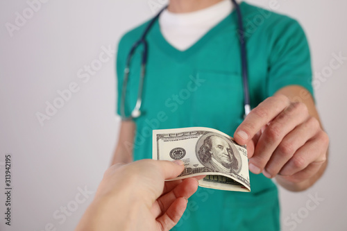Corruption and bribery in Healthcare and medicine. Doctor taking money. Health insurance