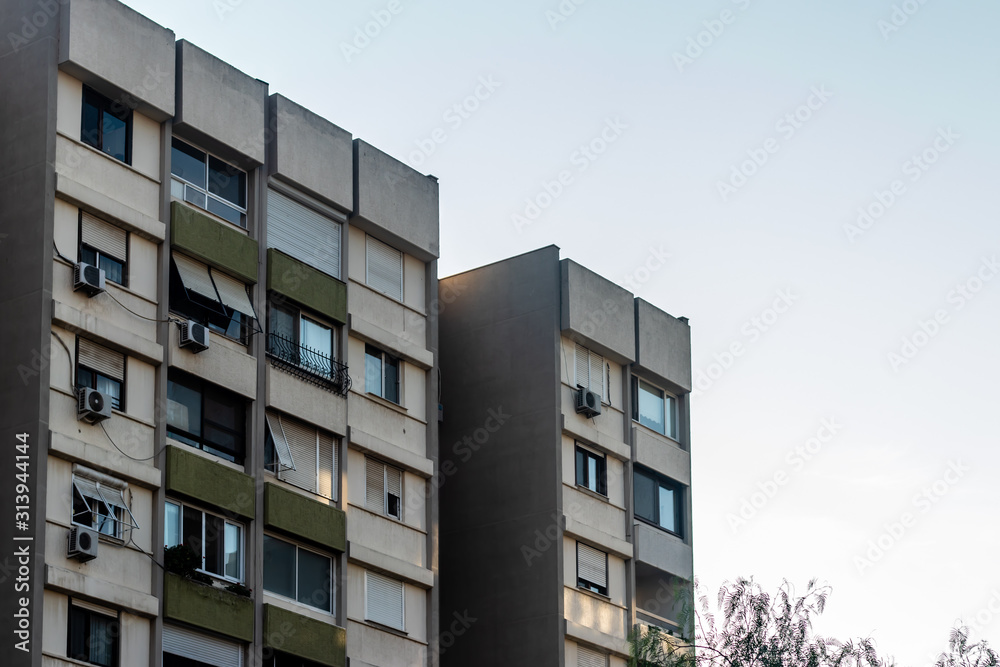a well angled corner perspective shoot from a building with clear blue sky as background a well angled corner perspective shoot from a building with clear blue sky as background