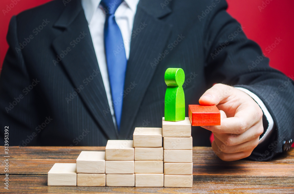 A businessman raises an employee up the career ladder. Increase in work, transition to a new level. Progress and professional growth. Appointment of an employee to a new position. Success A businessman raises an employee up the career ladder. Increase in work, transition to a new level. Progress and professional growth. Appointment of an employee to a new position. Success