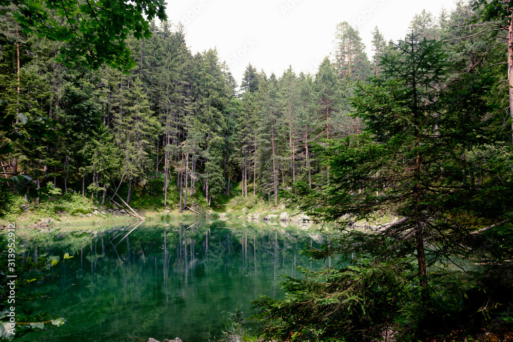 summer mountain landscape by the lake, concept of relaxation in the mountains summer mountain landscape by the lake, concept of relaxation in the mountains