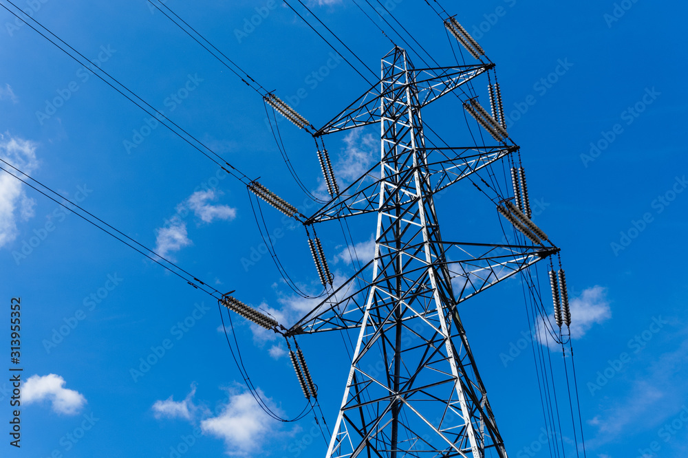 Electricity pylon with blue sky - obrazy, fototapety, plakaty 