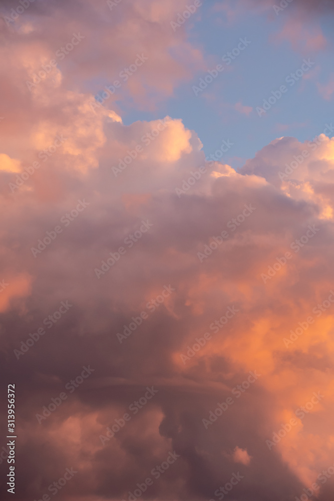 Red sky clouds background. Beautiful landscape with clouds and orange sun on sky