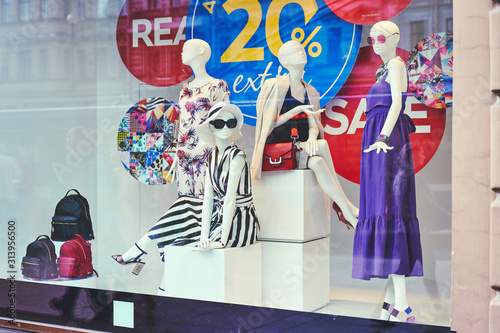 Obraz na płótnie Boutique window with dressed mannequins
