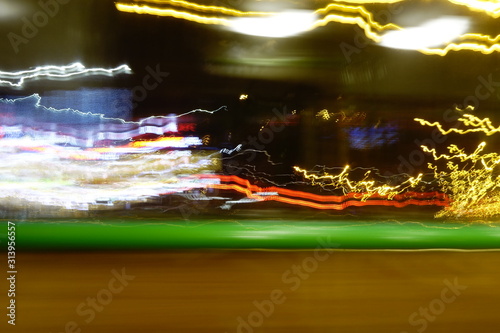 Traveling on bus at night abstract in light trails