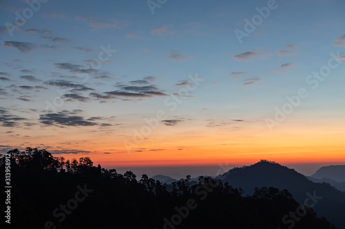Mountain valley during sunrise. Natural summer landscape © AungMyo