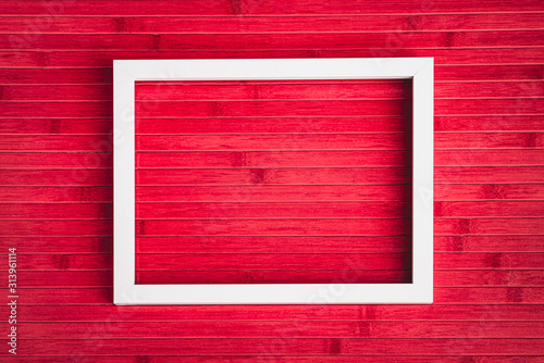 Wallpaper Mural Empty white photo frame on old red wine wooden table for background texture Torontodigital.ca