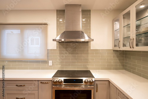 New and Modern Open Concept Kitchen with a Grey and White Color Scheme