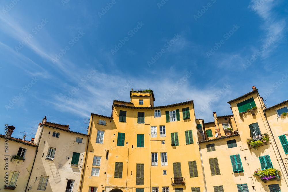 Traditional colorful ancient Italian architecture houses in Lucca