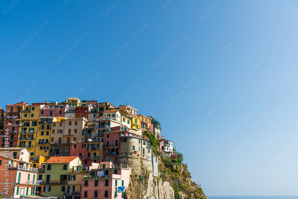 View at Manarola village in Cinque Terre, Italy, with its traditional colorful houses 