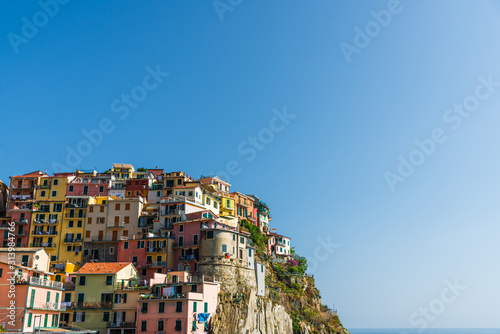 View at Manarola village in Cinque Terre, Italy, with its traditional colorful houses 