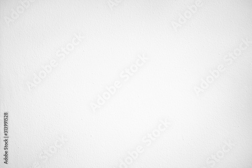Abstract empty white and gray gradient soft light background of studio room for art work design. photo