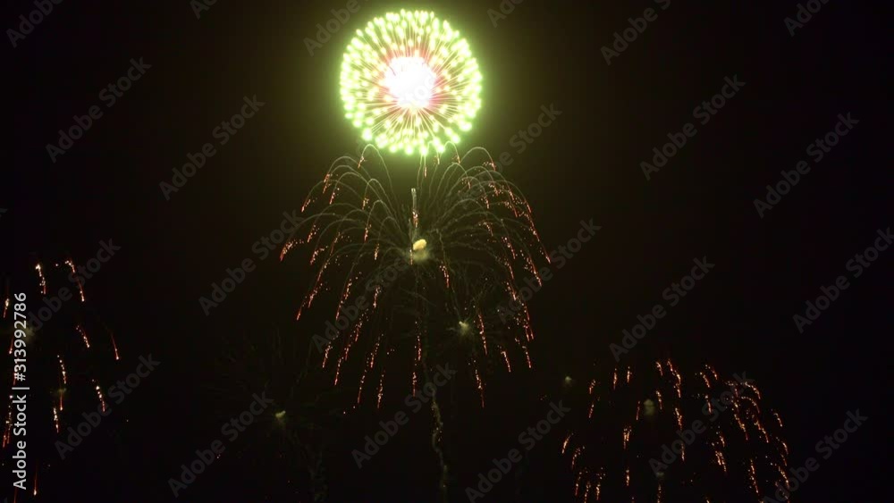 Beautiful abstract colourful Fireworks explode display on sky at night a symbol of celebration in New years anniversary for background