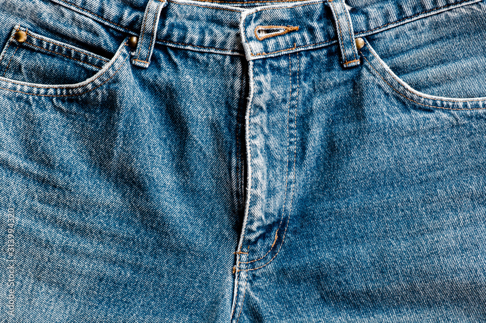 Detail of nice blue jeans textile tuxture for background with vintage tone. Detail of nice blue jeans textile tuxture for background with vintage tone.