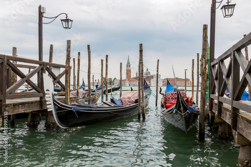 Jetty with gondolas on the Venice promenade © i_valentin