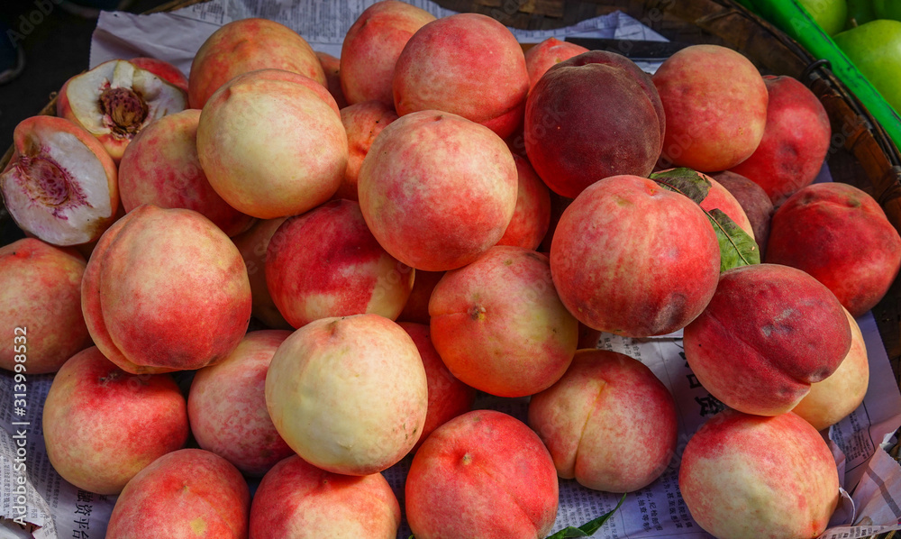 Sweet red ripe peaches at the rural market Sweet red ripe peaches at the rural market