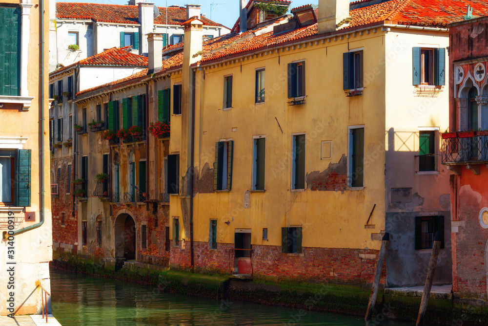 Canal in Venice, Italy with traditional colorful houses