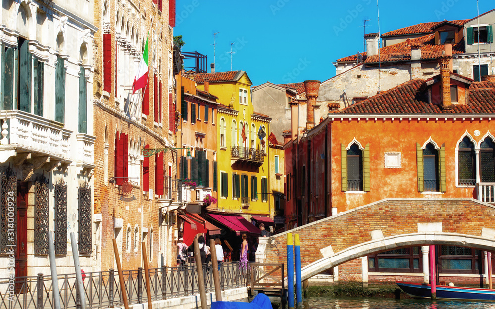Canal in Venice, Italy with traditional colorful houses