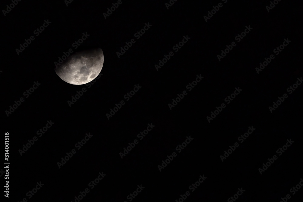 Night View of Half Moon Isolated on Dark Sky for Background Night View of Half Moon Isolated on Dark Sky for Background