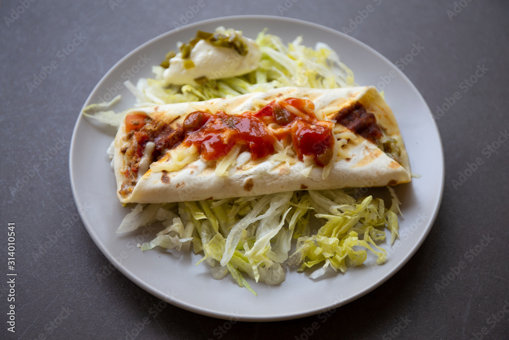 Quesadilla Wrap Sandwich with Lettuce and salsa Quesadilla Wrap Sandwich with Lettuce and salsa
