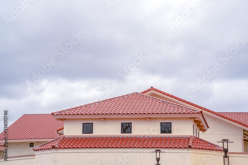 Tiled roof on a building with ventilation windows