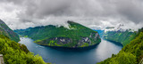View over Geiranger fjord and Seven Sisters waterfall from Ornesvingen-Eagle view point in summer