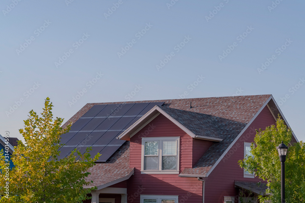 Array of photovoltaic solar panels on a roof