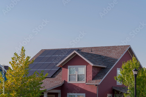 Array of photovoltaic solar panels on a roof