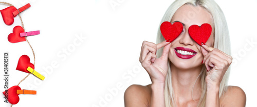 Valentine's day. Happy woman with red hearts in her eyes with a smile on a white background. Isolate. Wallpaper, flyers, invitations, posters, brochures, banners.