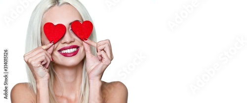 Valentine's day. Happy woman with red hearts in her eyes with a smile on a white background. Isolate. Wallpaper, flyers, invitations, posters, brochures, banners.